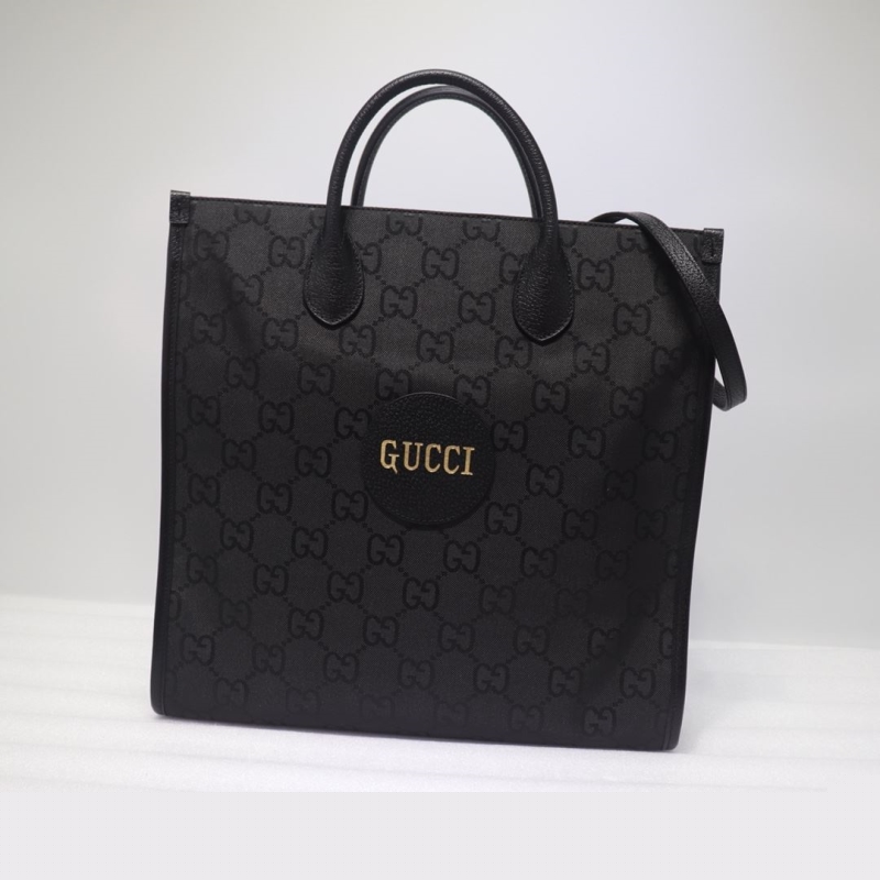G*u*i shopping bags
